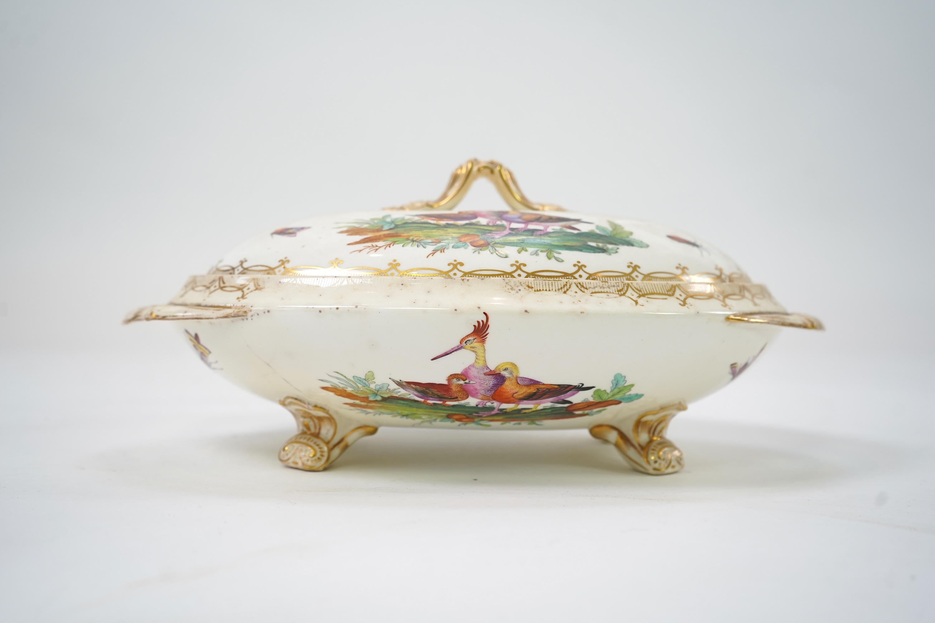 A Coalport bird painted part dinner service, mid 19th century